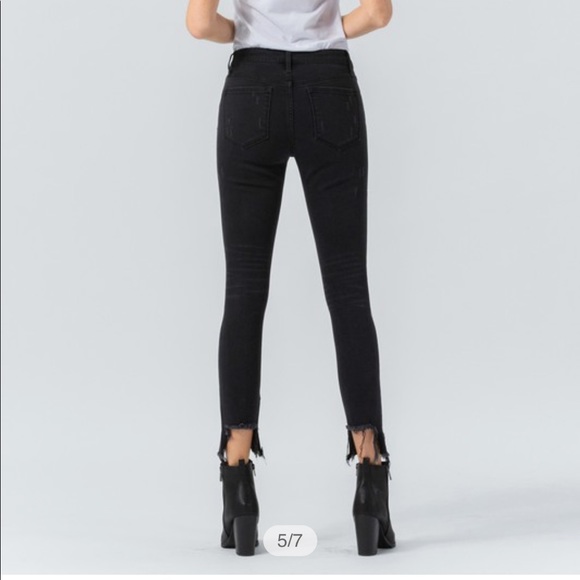 Midrise distressed shark bite skinny black jean - Picture 4 of 7